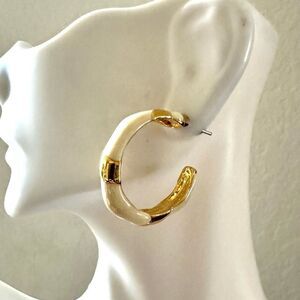 Cream and gold tone hoop earrings